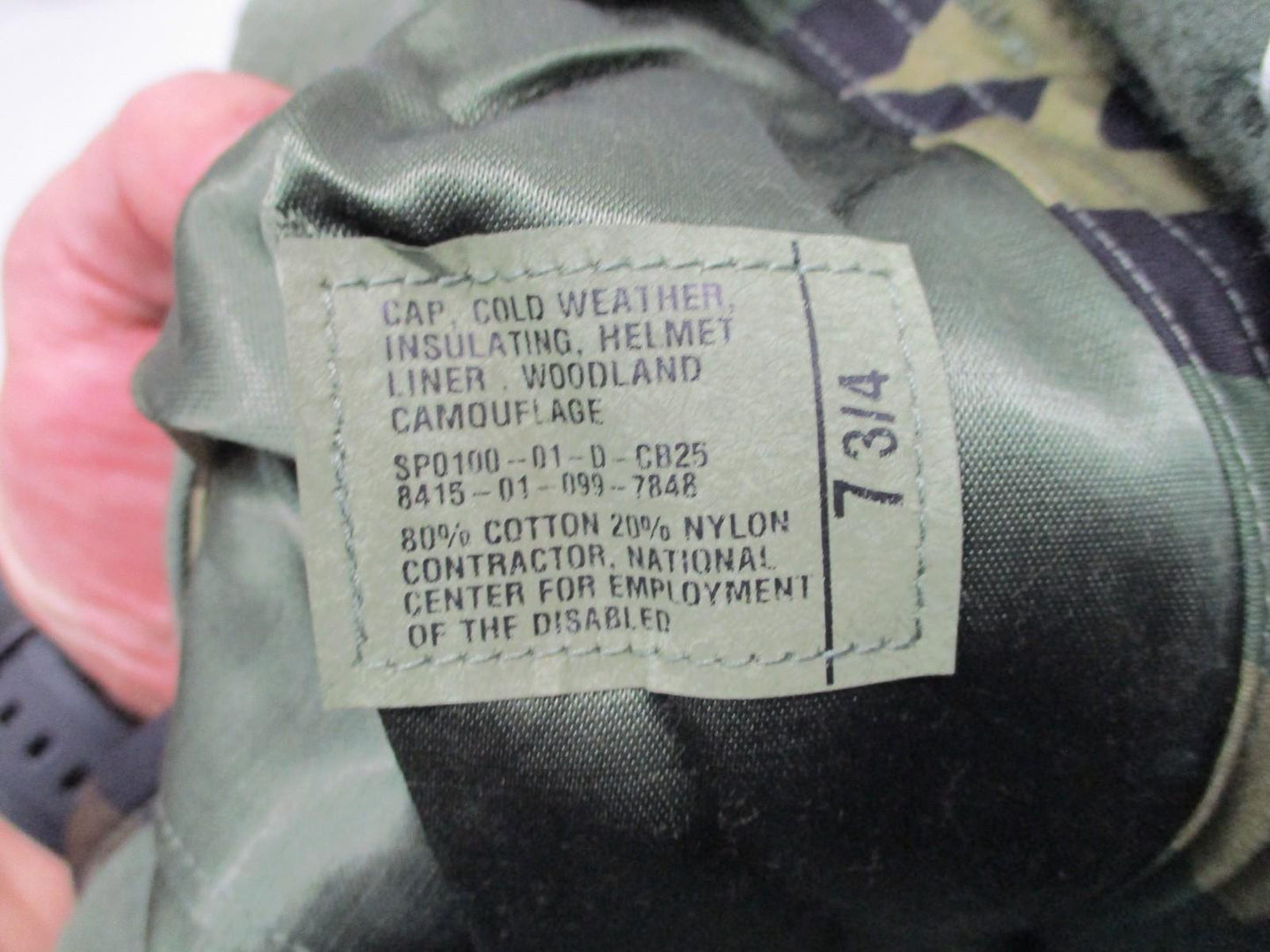 Centex Military Gear combat helmet with woodland camouflage liner and pile cap for extreme cold weather, size 7-3/4.