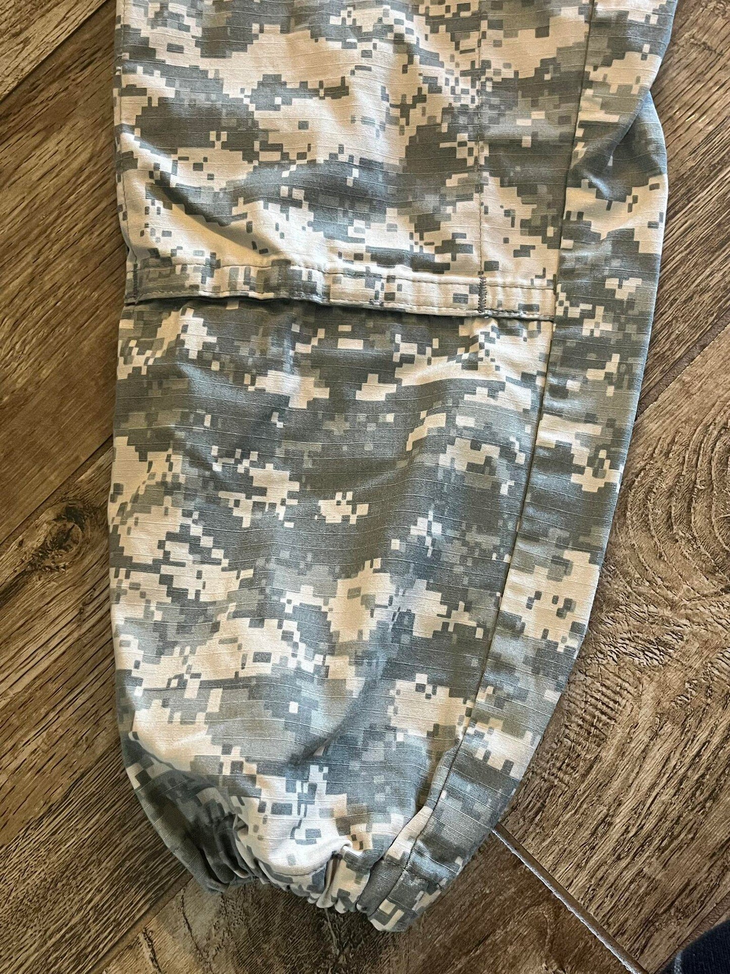 Army ACU digital camo cargo pants by Centex Military Gear, small regular size, with altered ankles, military uniform style.