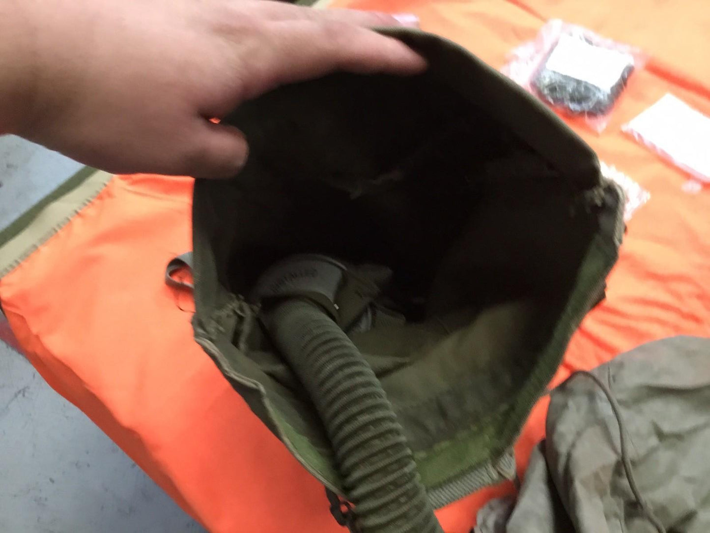 Small size Usgi M25a1 pilot gas mask by Centex Military Gear with adjustable straps and clear eye lenses.