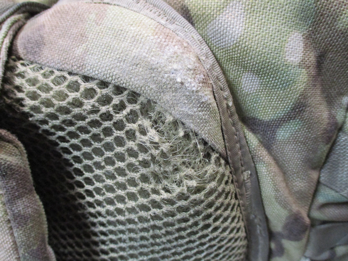 MOLLE 4000 Airborne rucksack in camouflage with cracked frame and used fair condition