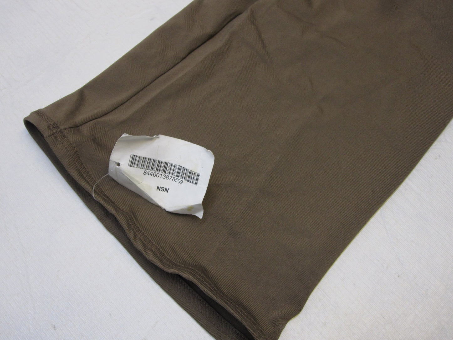 Brown USGI military neck gaiter face warmer by Centex Military Gear, made of durable poly material, worn around the neck or face.