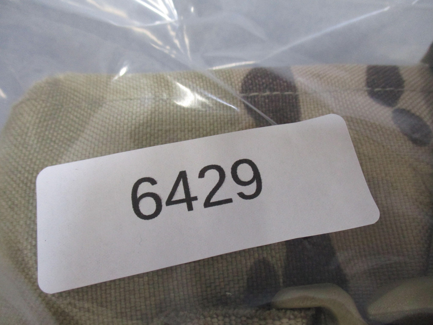 USGI Multicam IFAK pouch by Centex Military Gear with expired medical supplies, military-style first aid kit and pouch.