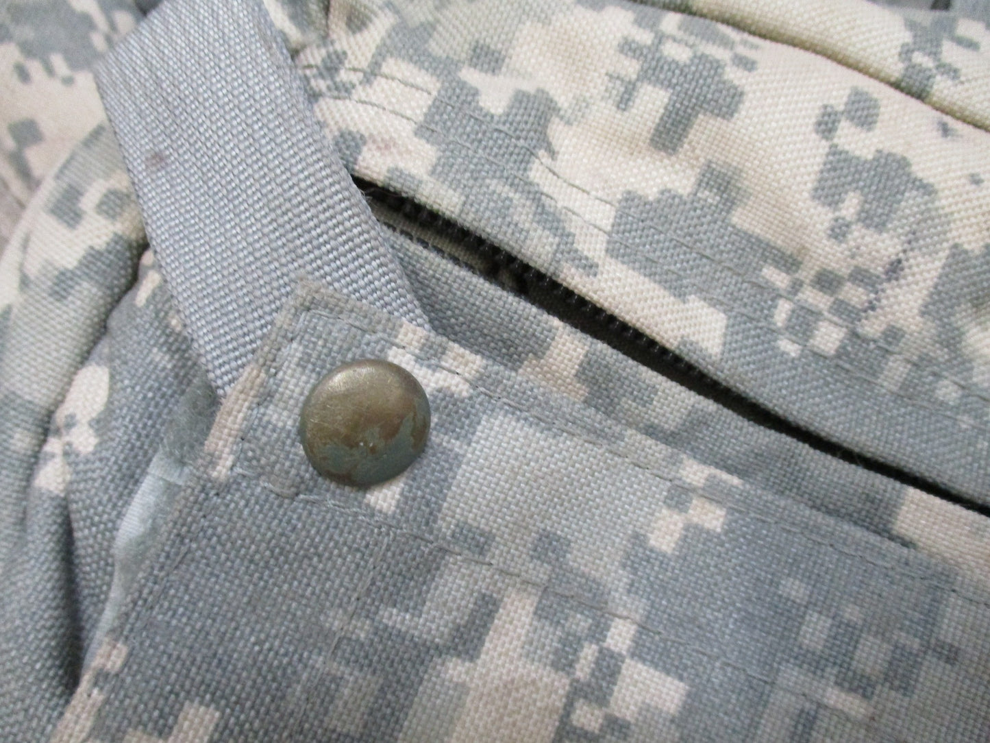 Empty USGI CLS medical bag in ACU Digital camouflage, military combat lifesaver bag by Centex Military Gear.