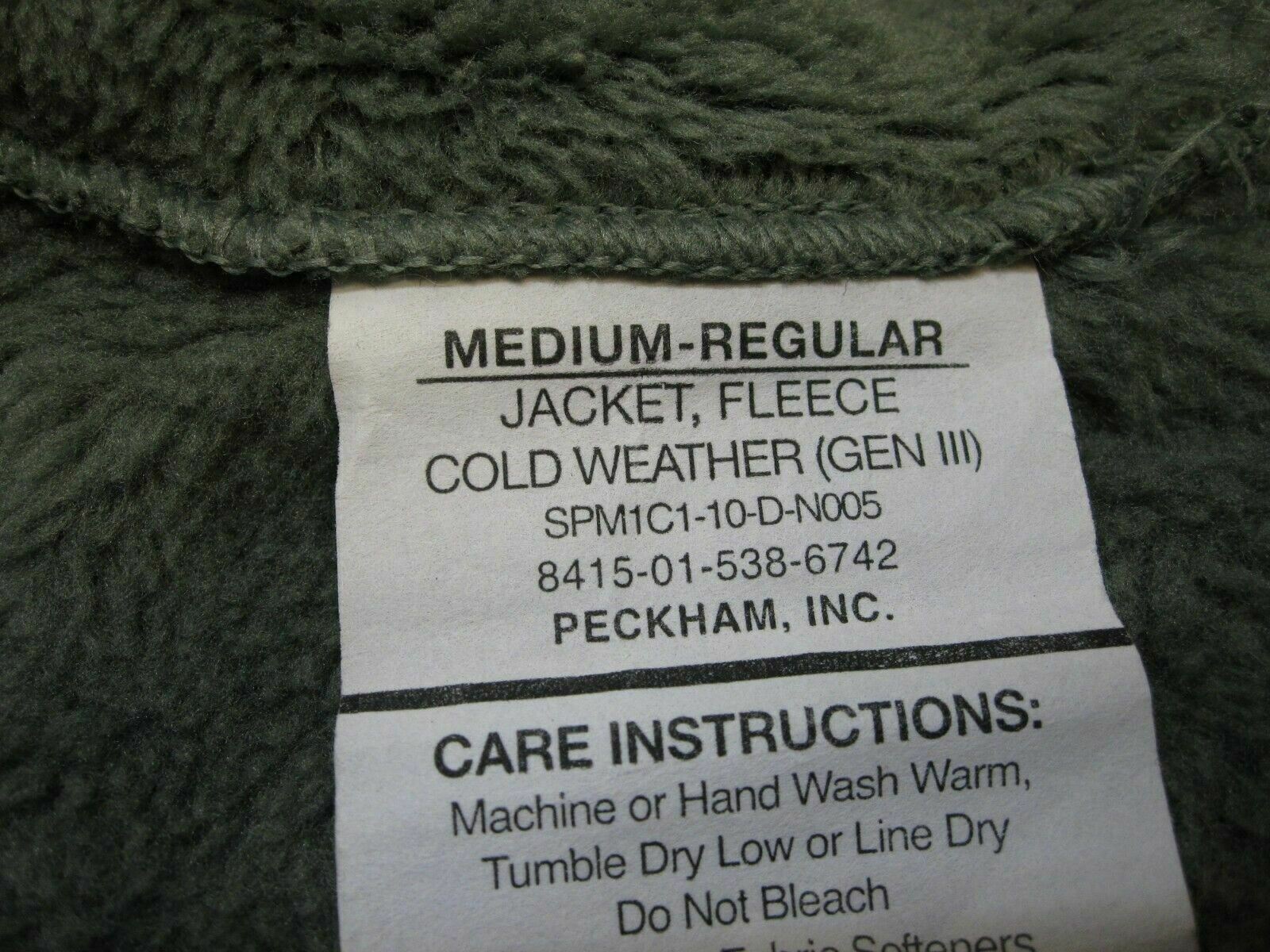 Used Polartec Gen III Army fleece jacket in foliage green with UCP camouflage, ideal for cold weather military wear.