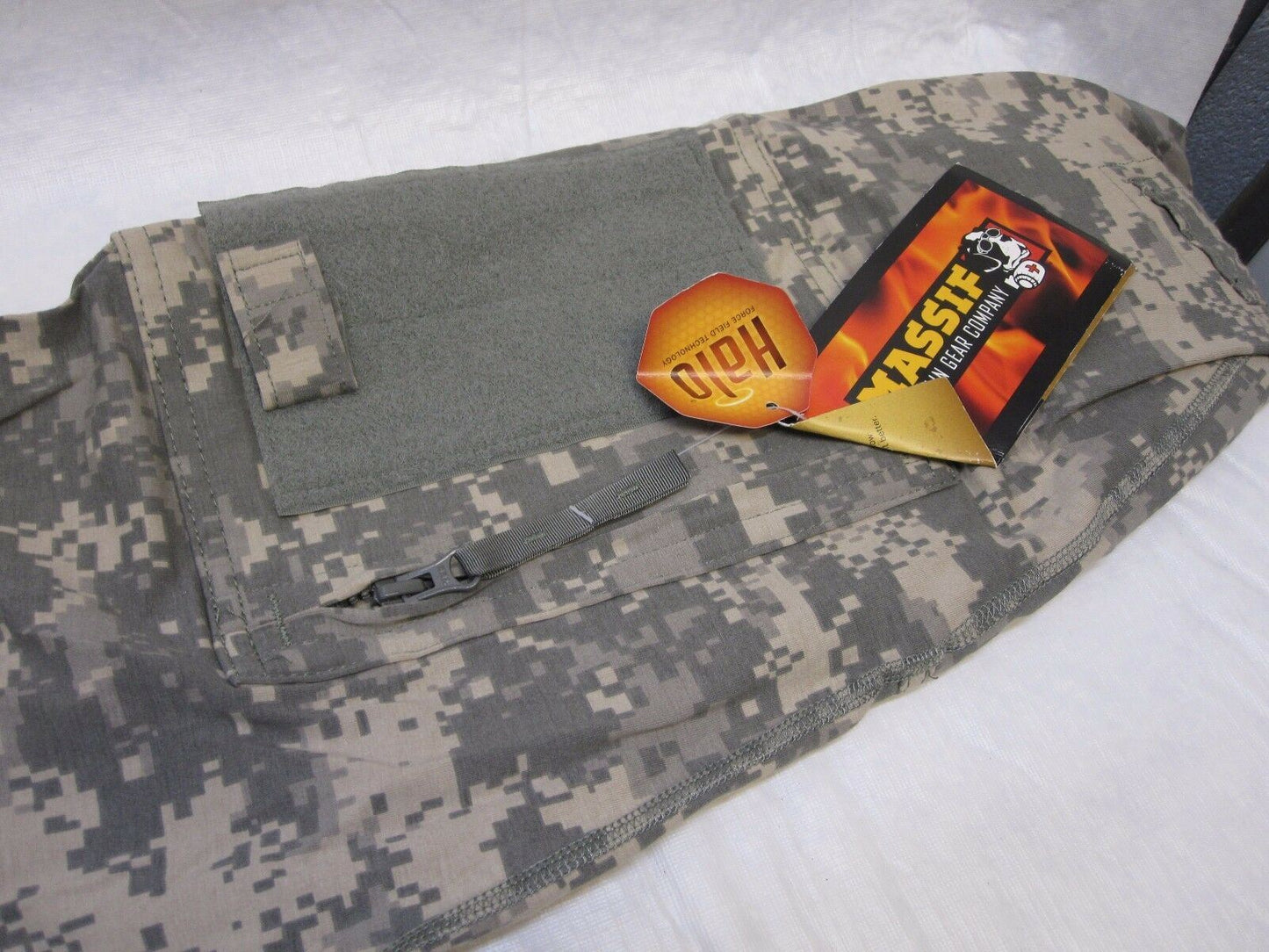 Centex Military Gear combat shirt with flame-resistant fabric, large front emblem, and ACU digital camouflage design.