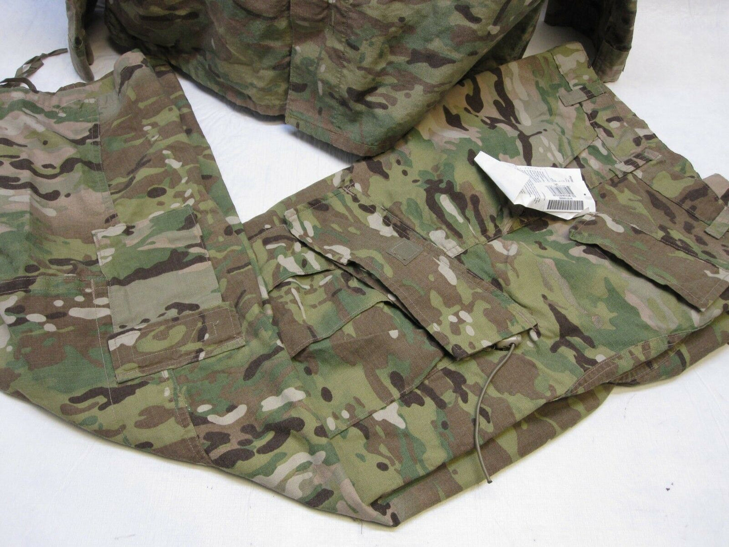 Army Issue Multicam uniform set with flame-resistant top and pants, medium/regular size, by Centex Military Gear.