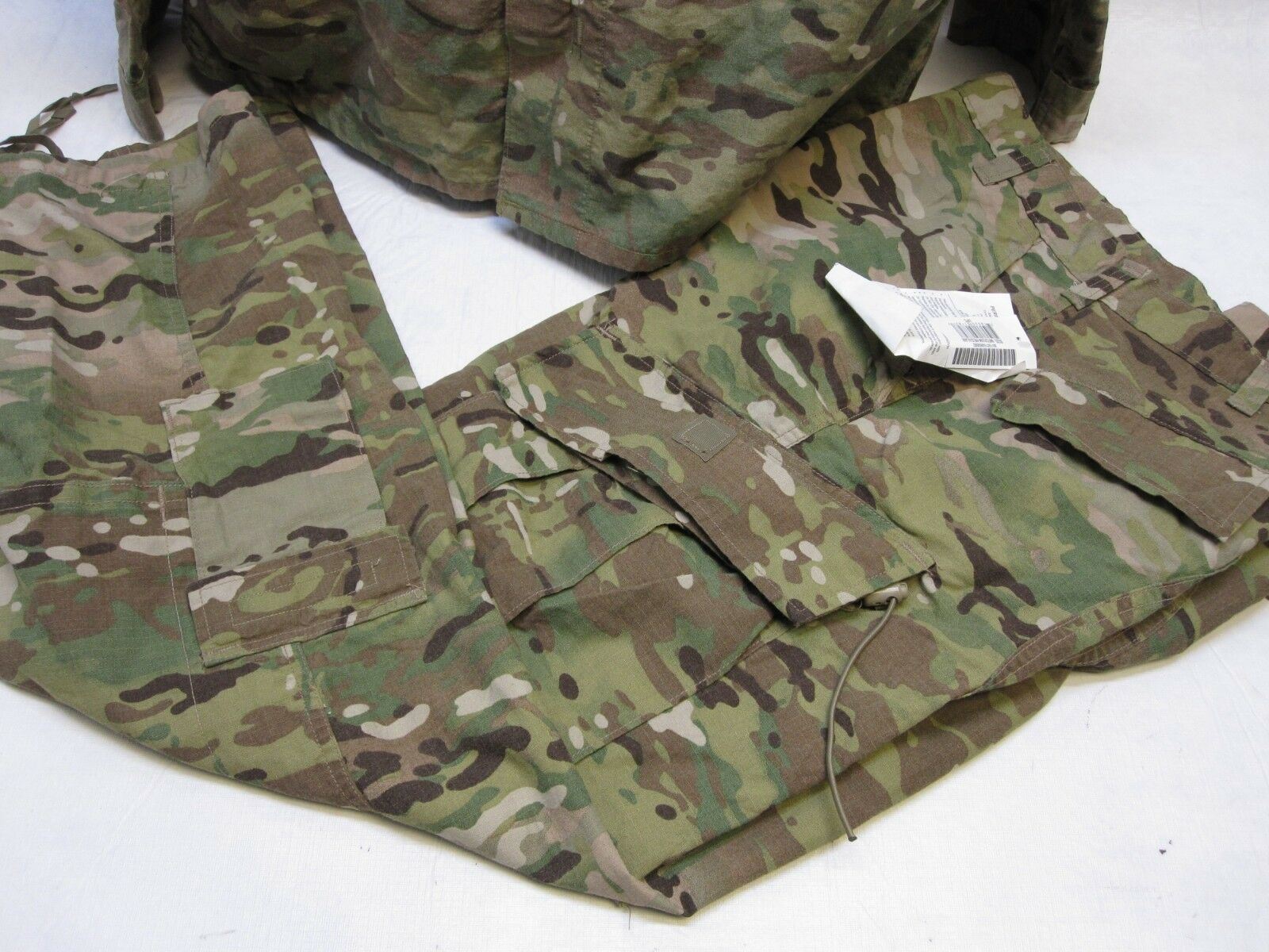 Army Issue Multicam uniform set with flame-resistant top and pants, medium/regular size, by Centex Military Gear.