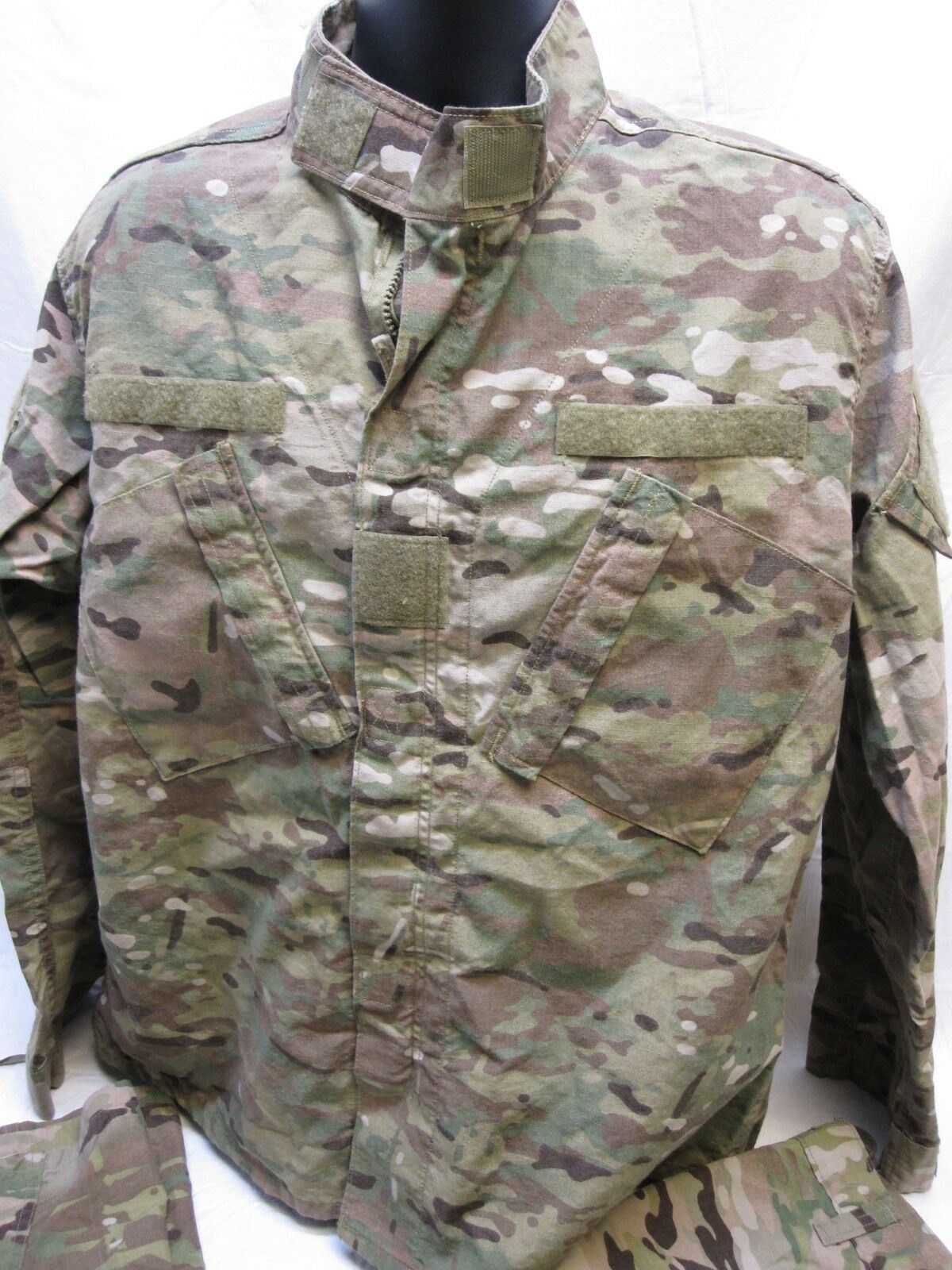 Army issue Multicam uniform set with flame-resistant top and pants, medium/regular size, by Centex Military Gear.