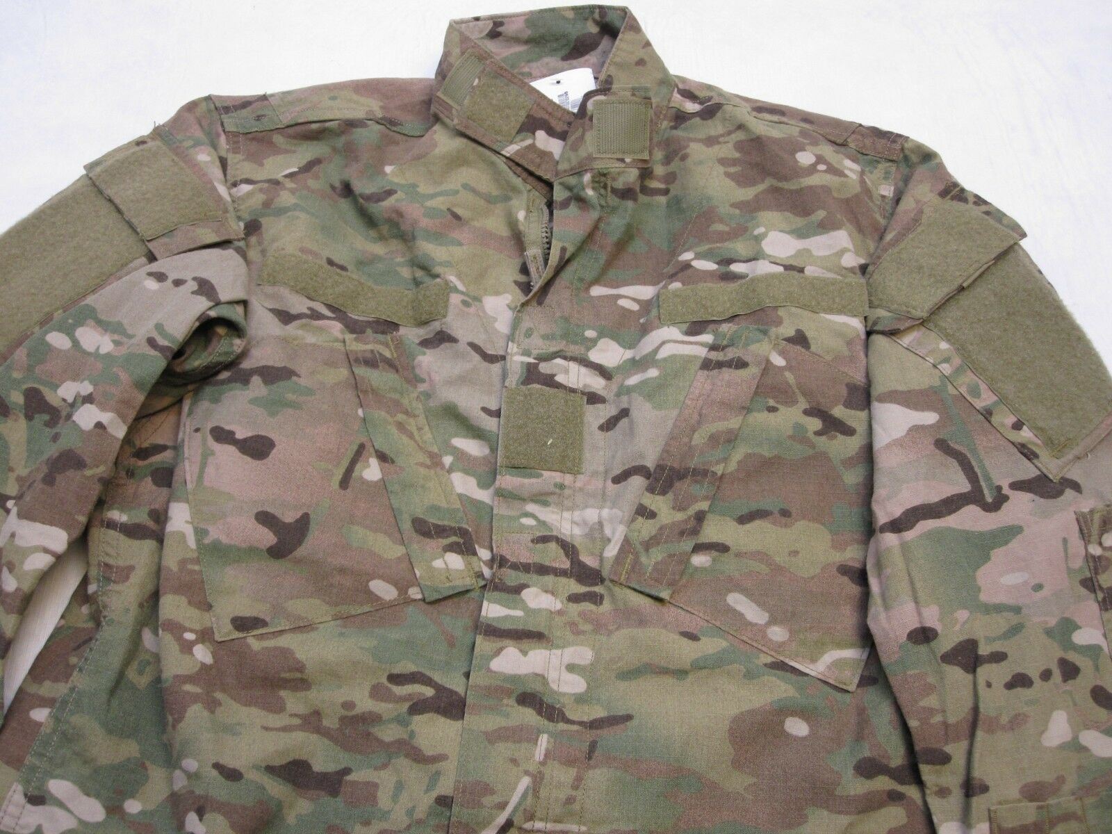 Army issue Multicam uniform set with flame-resistant top and pants in medium/regular size, by Centex Military Gear.