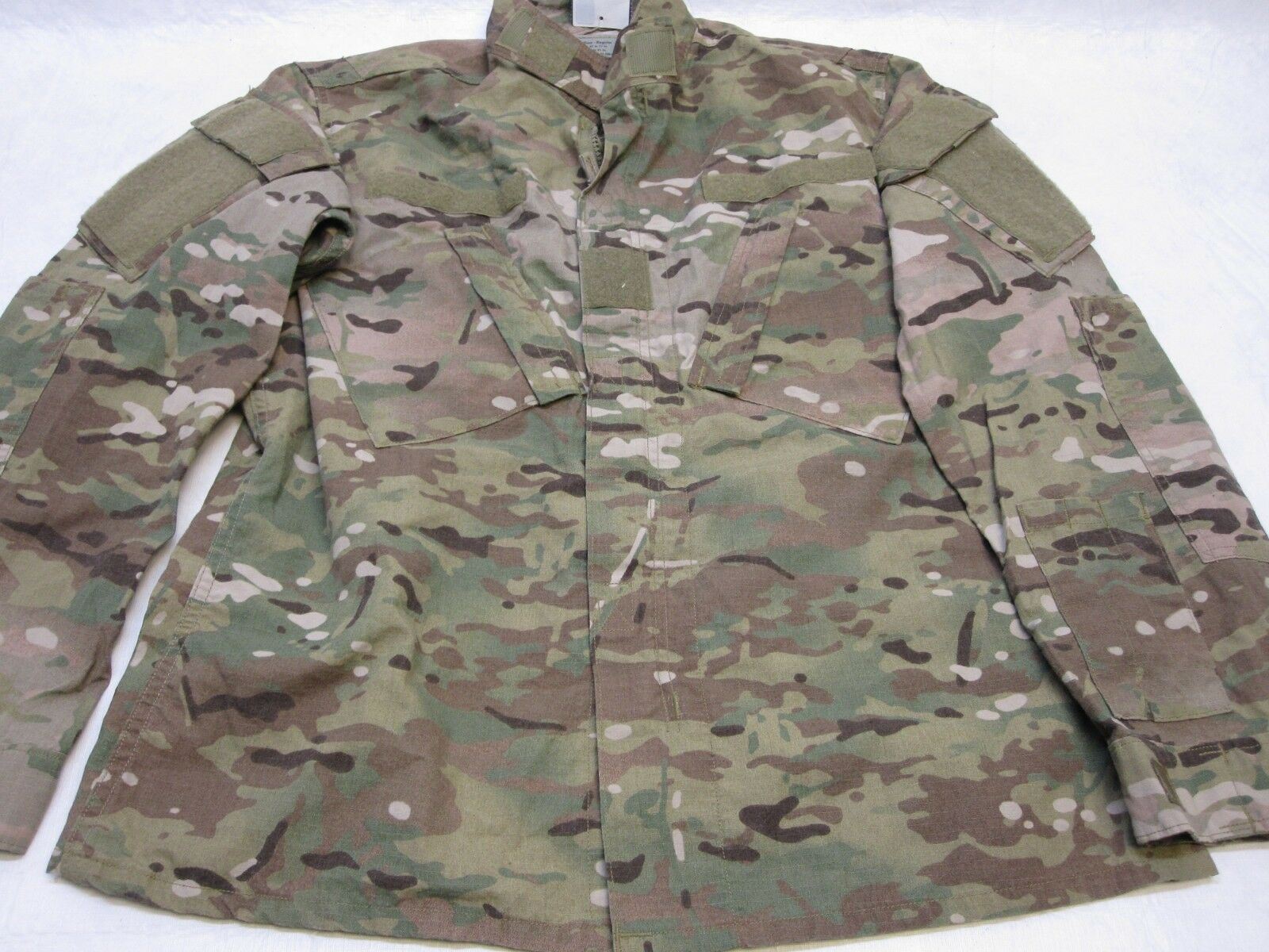 Army issue Multicam uniform set with flame-resistant top and pants, medium/regular size, by Centex Military Gear.