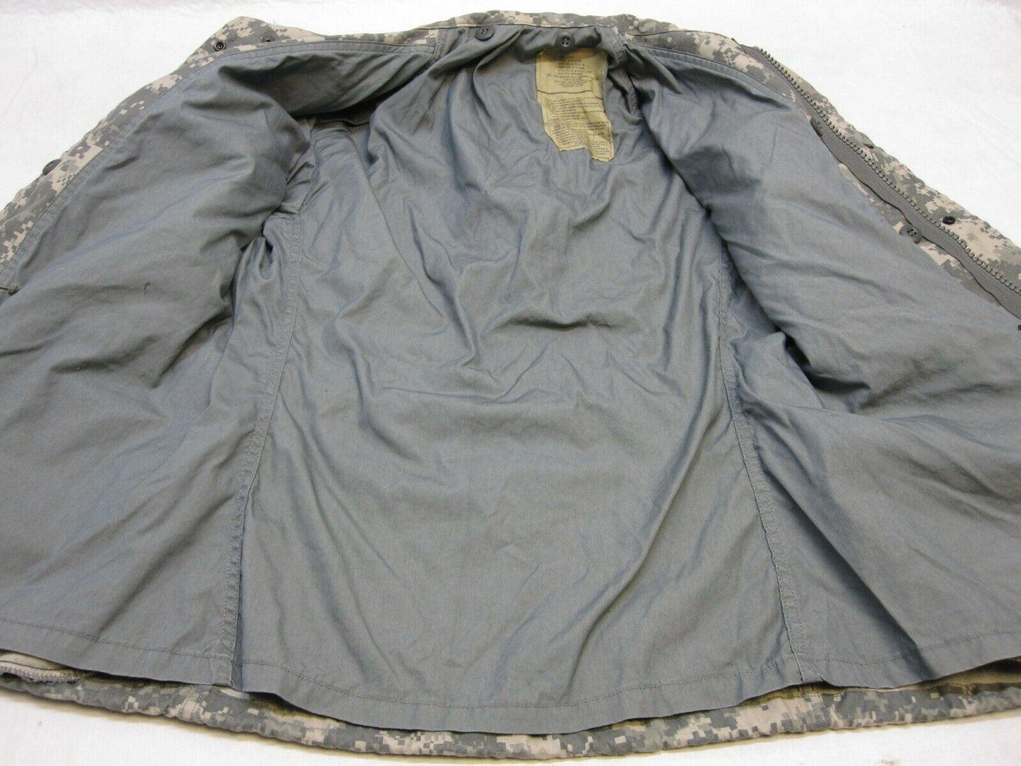 USGI Army ACU digital M-65 field jacket in medium/long size, cold weather coat with UCP camouflage, by Centex Military Gear.