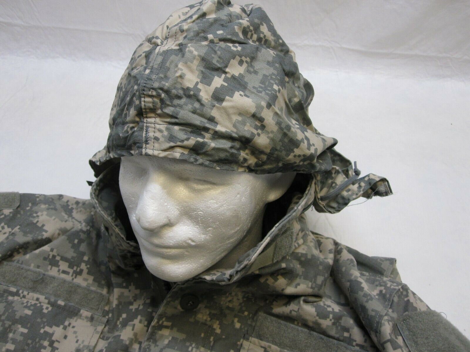 USGI Army ACU digital M-65 field jacket in medium/long size, UCP camouflage, cold weather coat by Centex Military Gear.