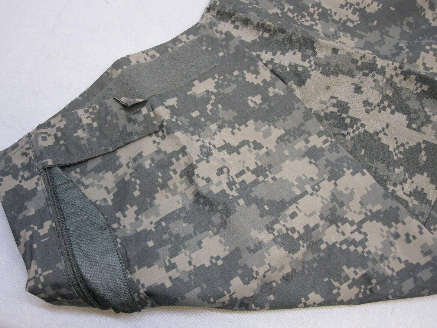 Army issue ACU digital Gore-Tex cold/wet weather trousers in large/regular, featuring durable fabric and camo pattern.