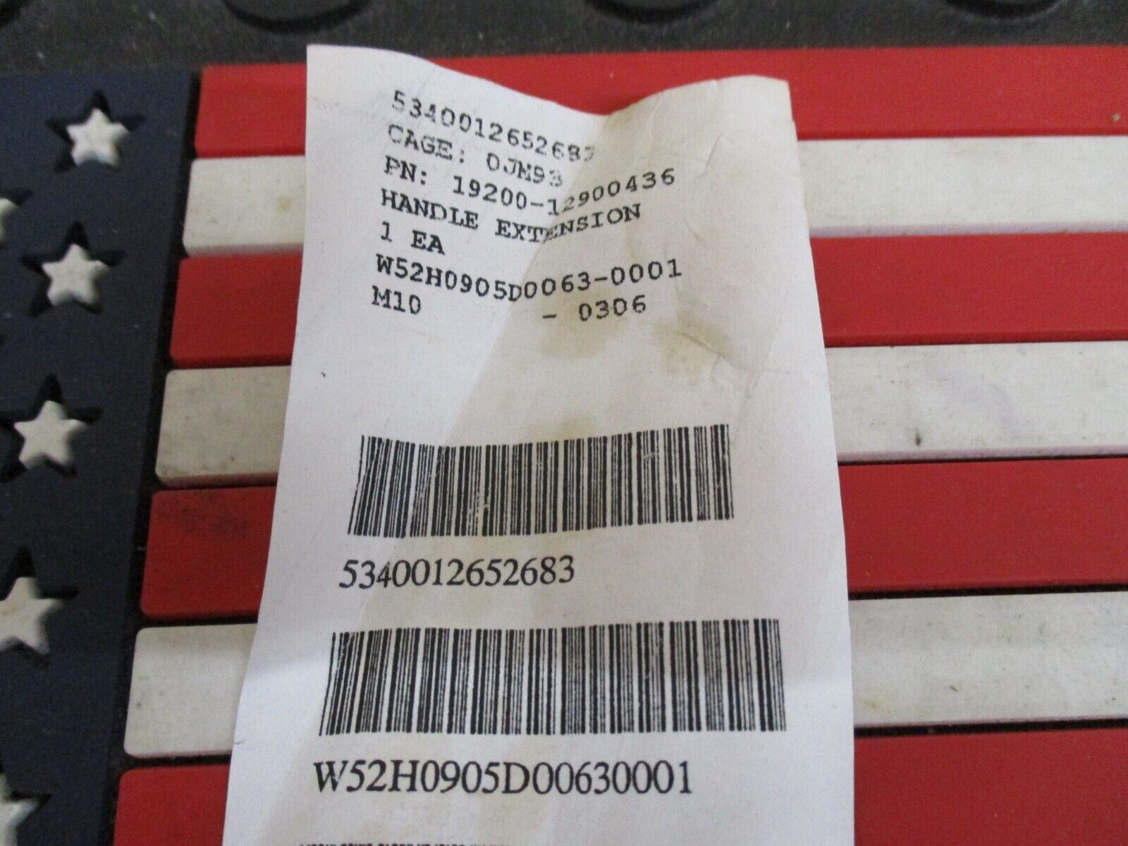 Centex Military Gear USGI 7.62 cleaning rod T-handle extension end piece on a white background