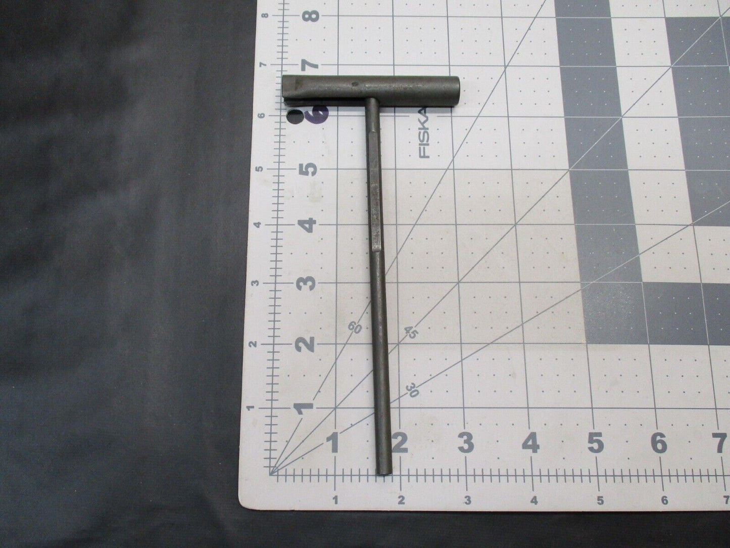 USGI 7.62 cleaning rod T-handle extension piece by Centex Military Gear, with detailed metal construction and threaded end.