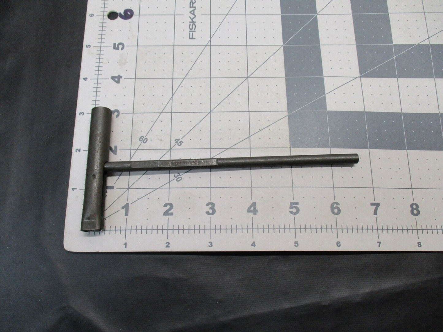 USGI 7.62 cleaning rod T-handle extension piece by Centex Military Gear, showing metal construction and threaded end.