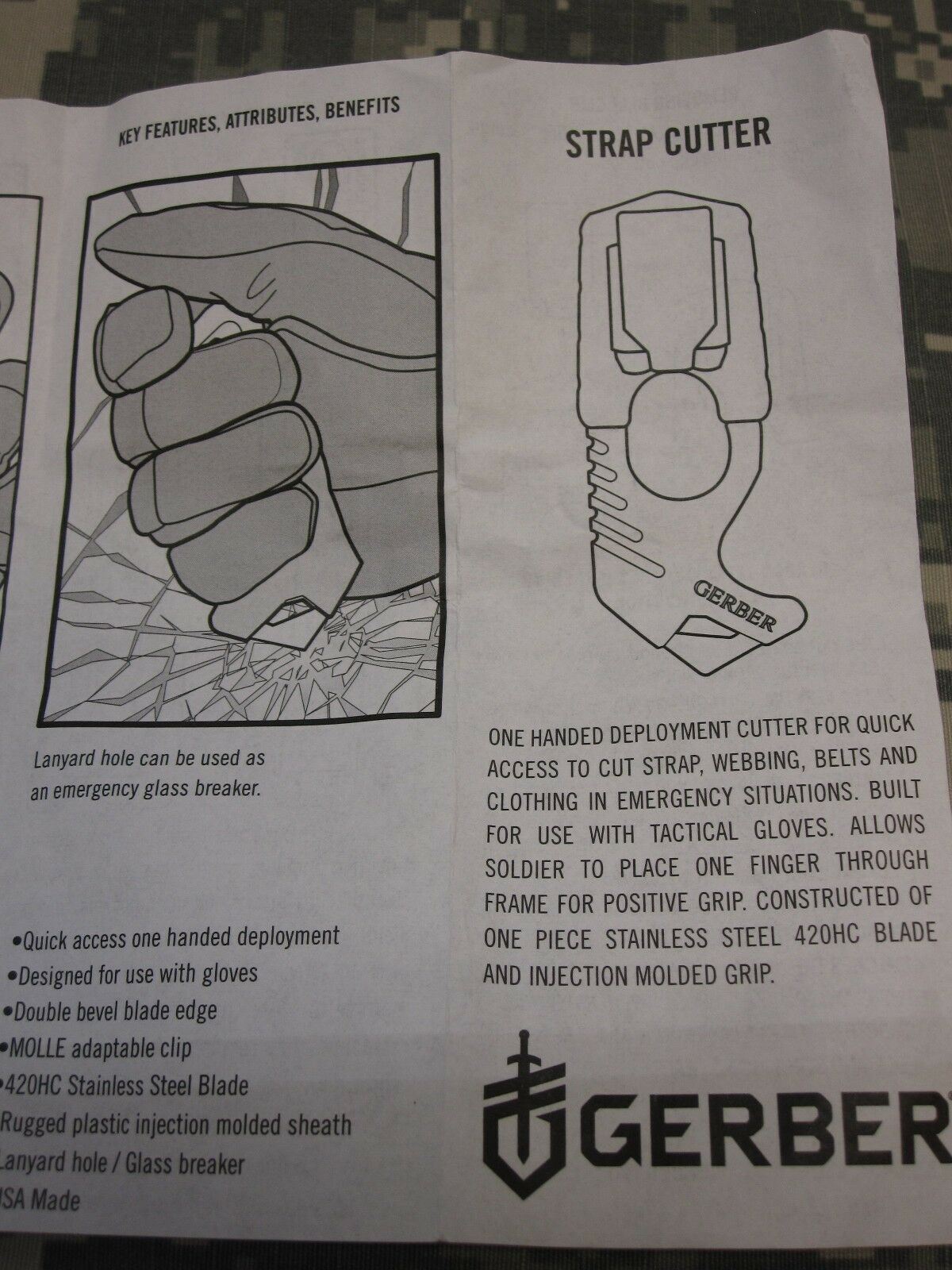 Coyote brown US military issue Gerber strap cutter seat belt hook knife with army OCP camouflage pattern