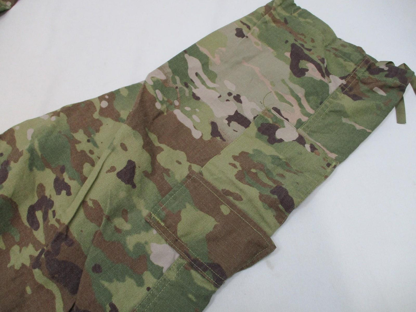 Unisex Army combat uniform OCP flame-resistant trousers in medium-short size, shown with tactical design and durable fabric.