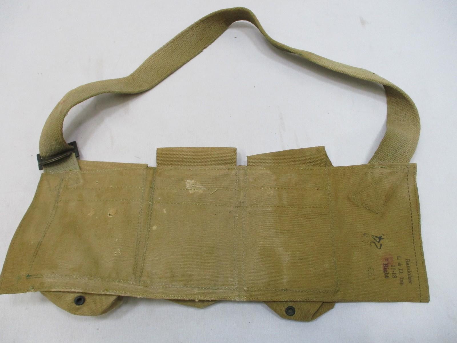 Vintage WWII-era canvas bandolier pouch by Centex Military Gear, military web gear with right-side design and metal buckle.