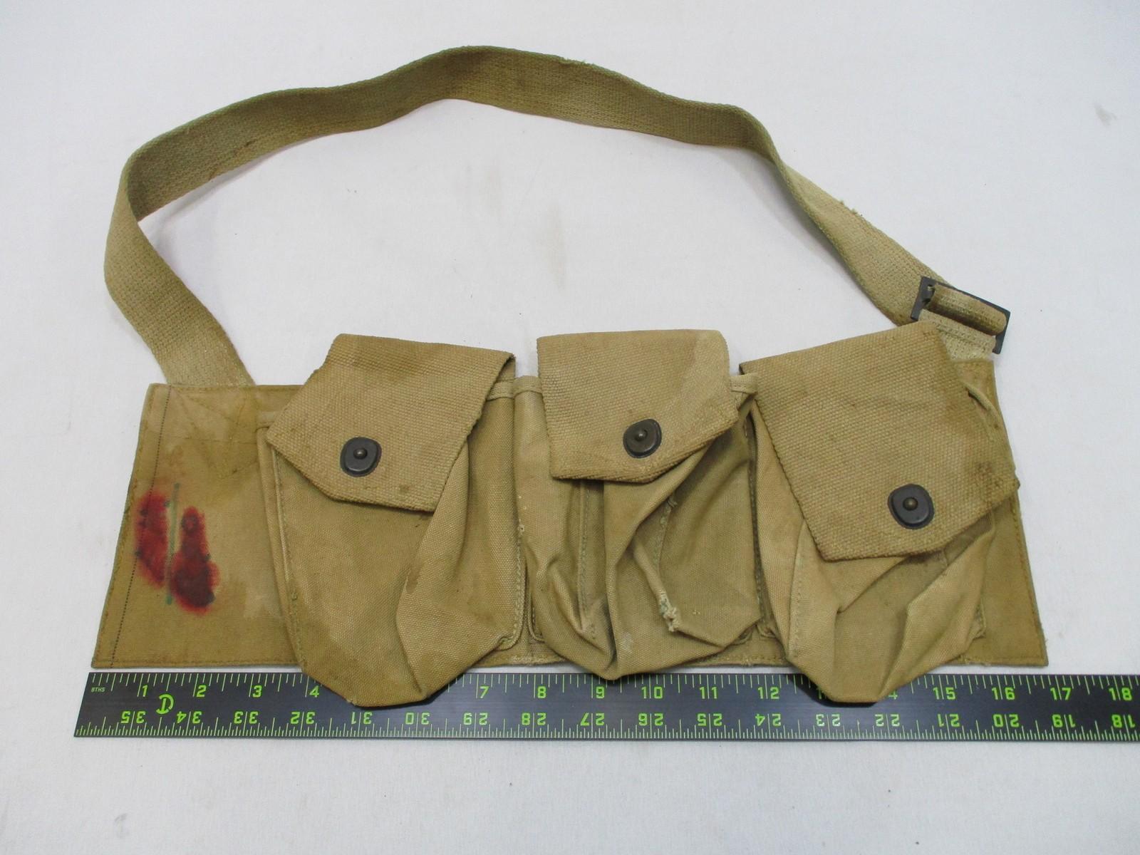 Vintage WWI era canvas bandolier pouch by Centex Military Gear with web gear and right BAR holder, military style web gear accessory.