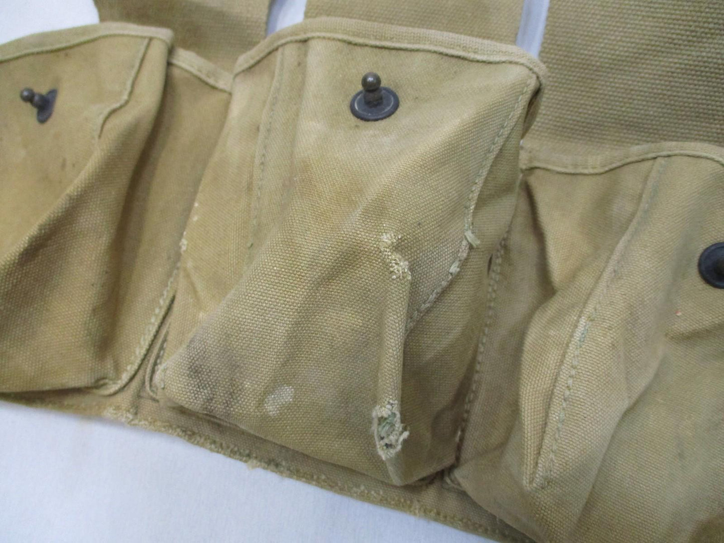 Vintage WWI-era bandolier pouch by Centex Military Gear, made of durable canvas military web gear with right barrel holder.