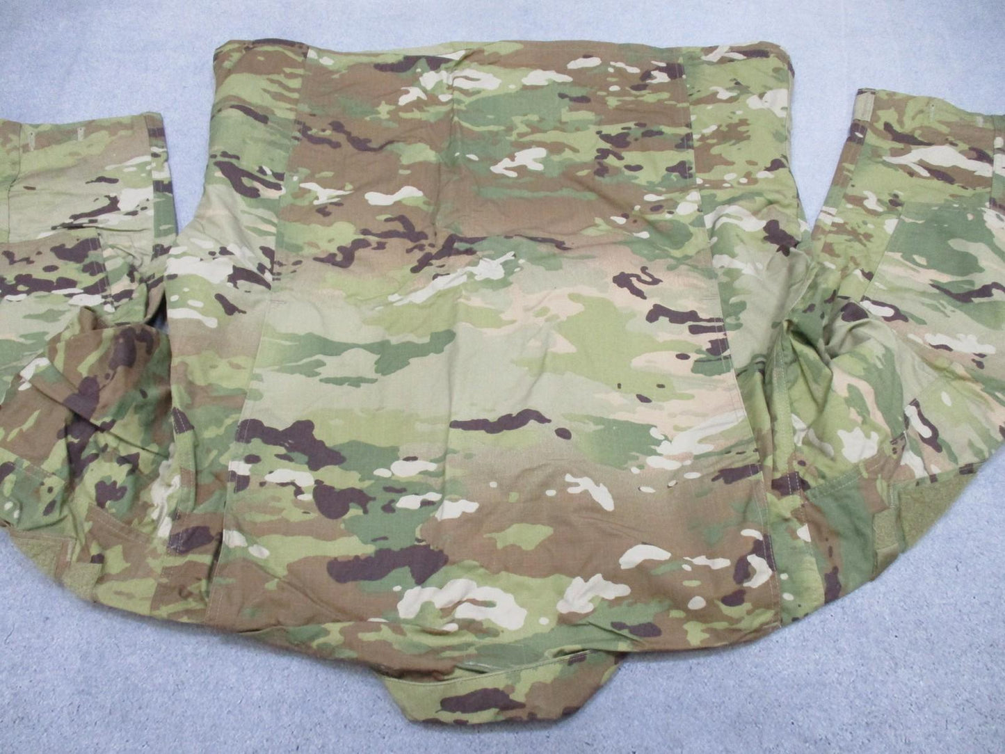 Unisex Army combat uniform shirt in OCP Scorpion camouflage, size large-regular, made of 50/50 NYCO by Centex Military Gear.