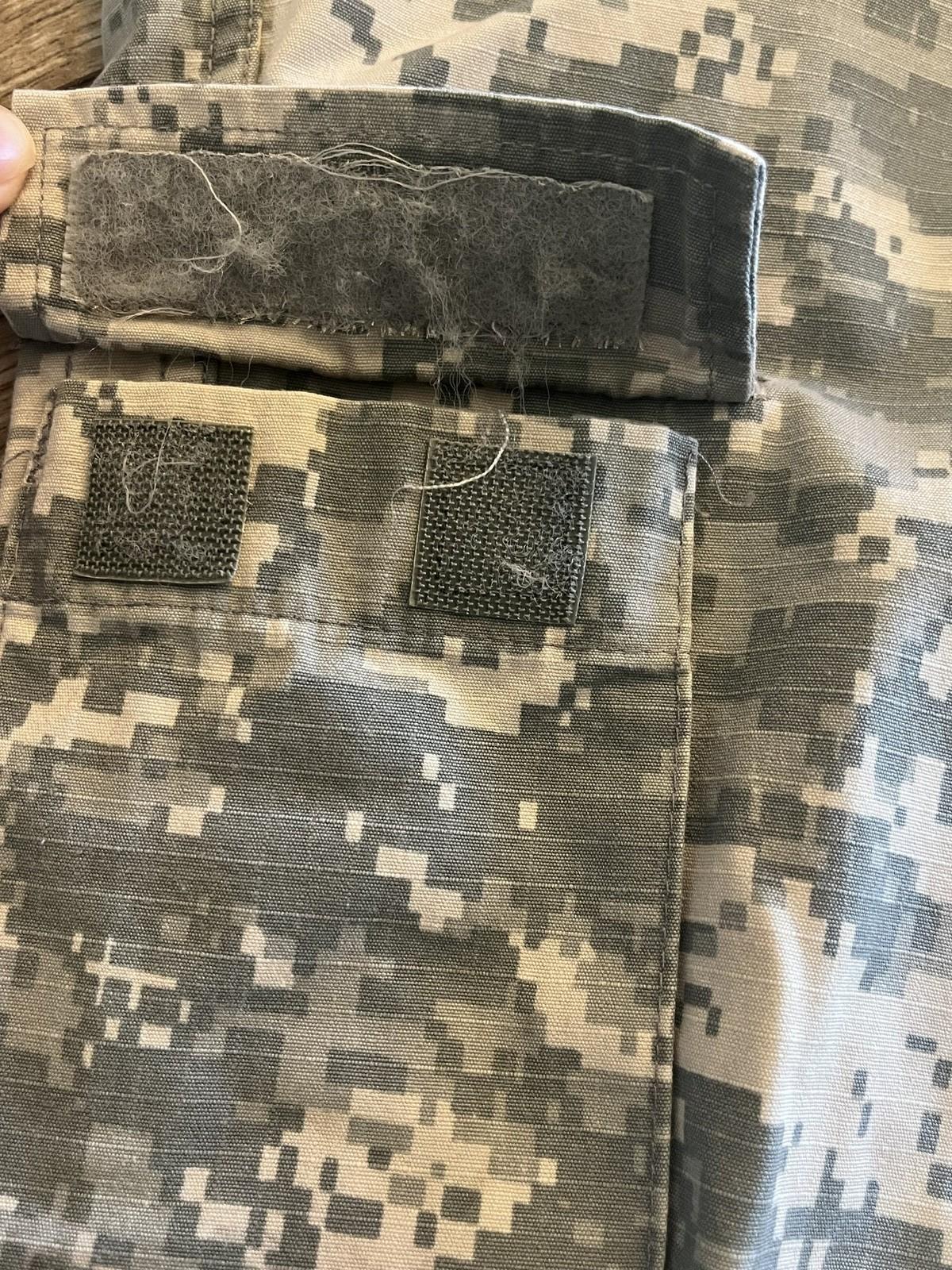 Used Centex Military Gear ACU digital camo cargo pants, medium short, with altered fit, suitable for tactical or outdoor use.