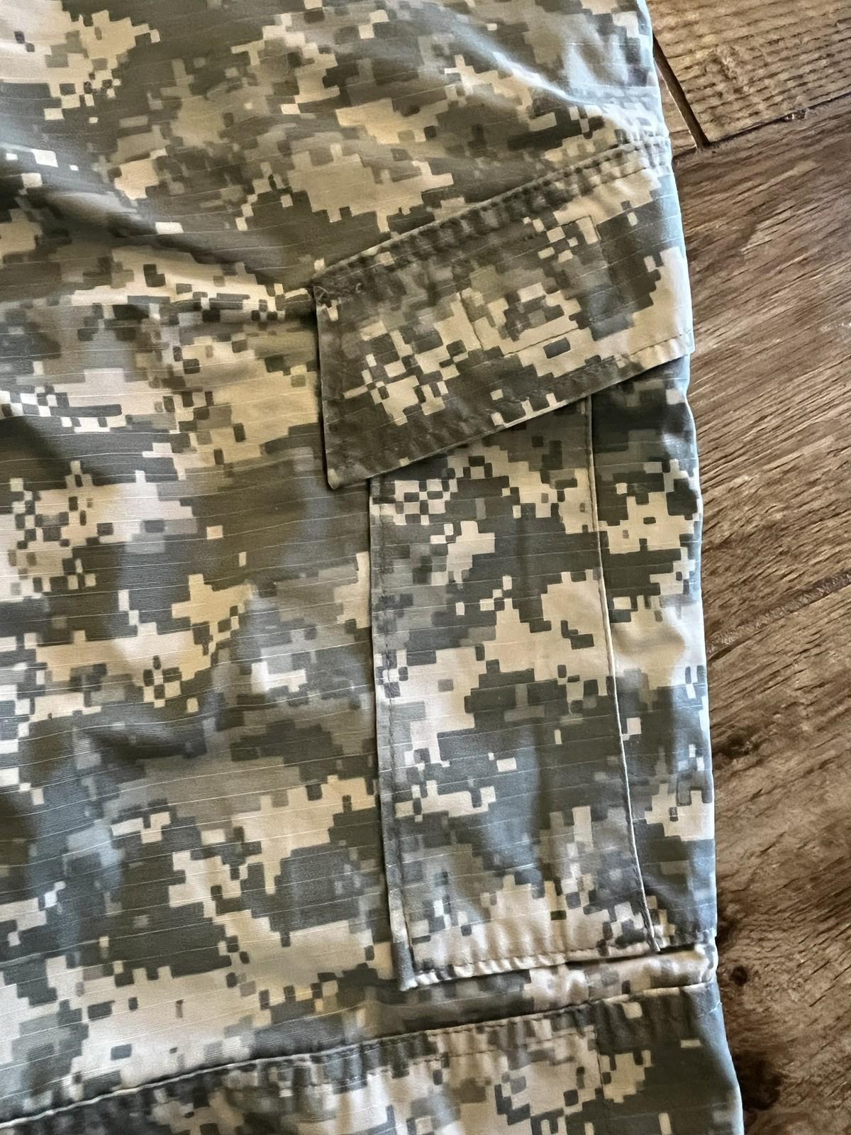 Used Centex Military Gear US Army ACU digital camo cargo pants, medium short size, showing front and pocket details.