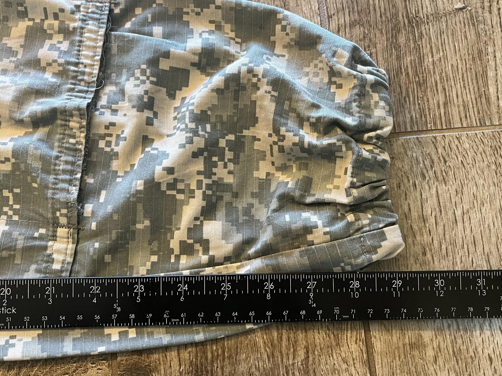 Used Centex Military Gear US Army ACU digital camouflage cargo pants in medium short size, showing front view with pockets and camouflage pattern.