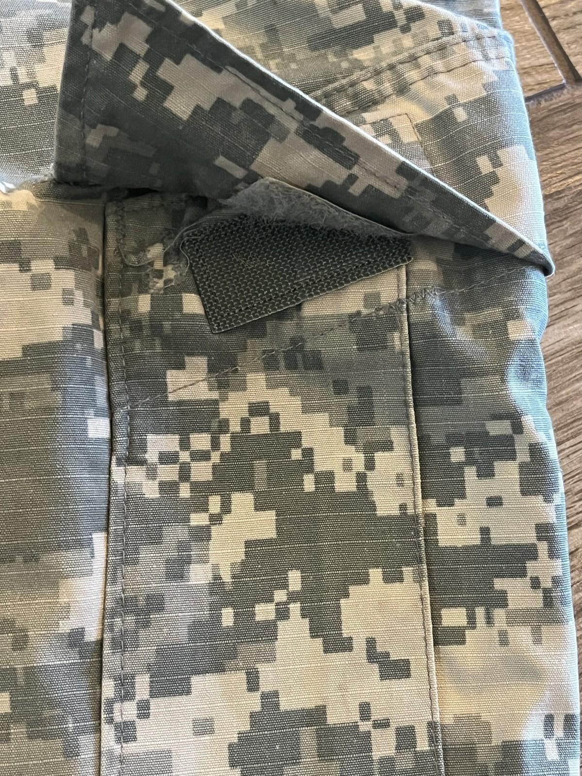 Used Centex Military Gear US Army ACU digital camouflage cargo pants, medium short size, with altered fit, in good condition.