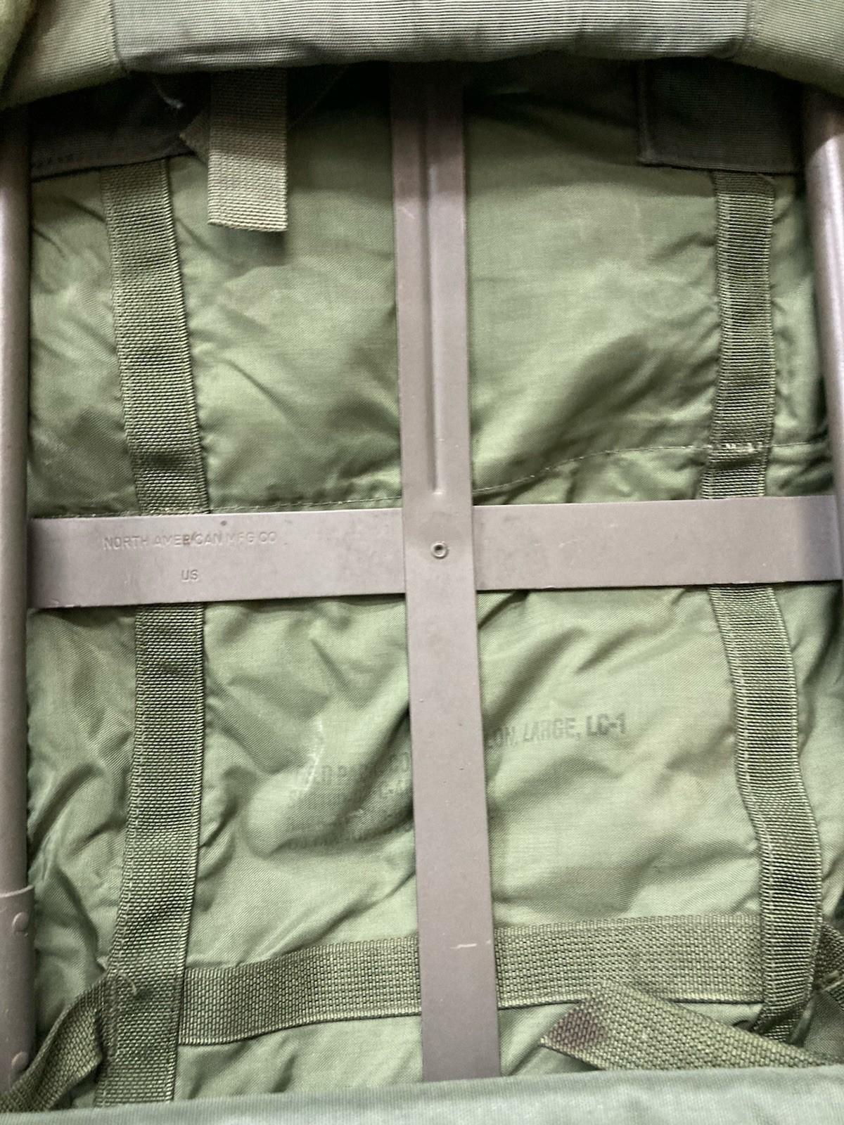 Centex Military Gear USGI Large Ruck Alice Pack Army Rucksack in olive drab with multiple compartments and adjustable straps.