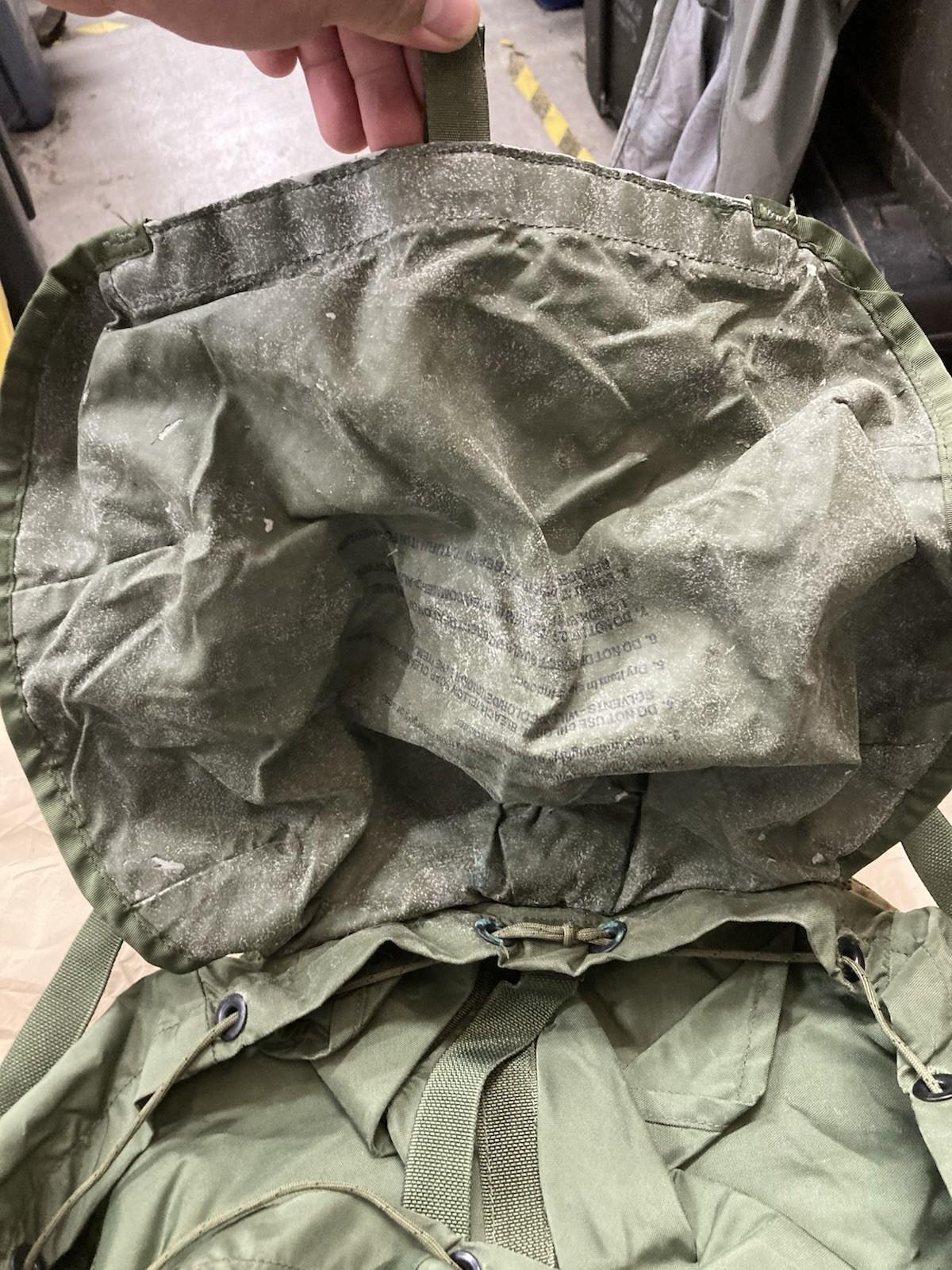 Large USGI Alice Pack army rucksack in olive green by Centex Military Gear, showcasing multiple compartments and durable straps.
