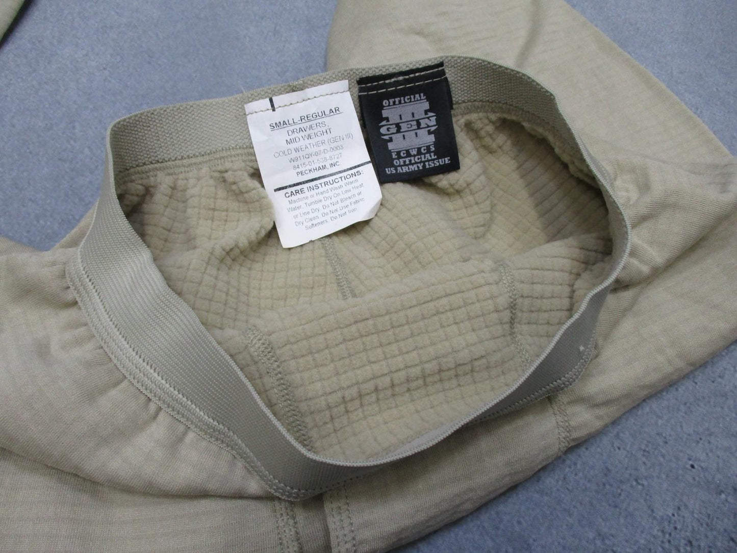 Small-Regular ECWCS GEN III thermal waffle pants in olive green, designed for cold weather by Centex Military Gear.