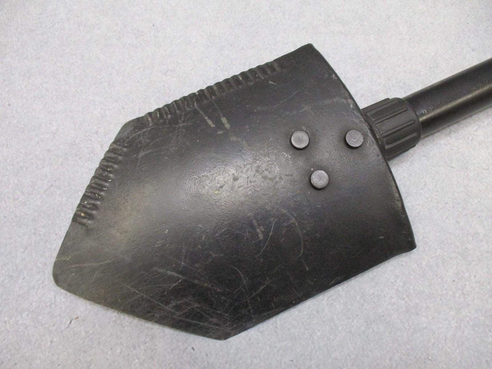 Centex Military Gear Ames folding shovel with pouch, featuring serrated edge, used for camping and hiking, U.S. military E-Tool