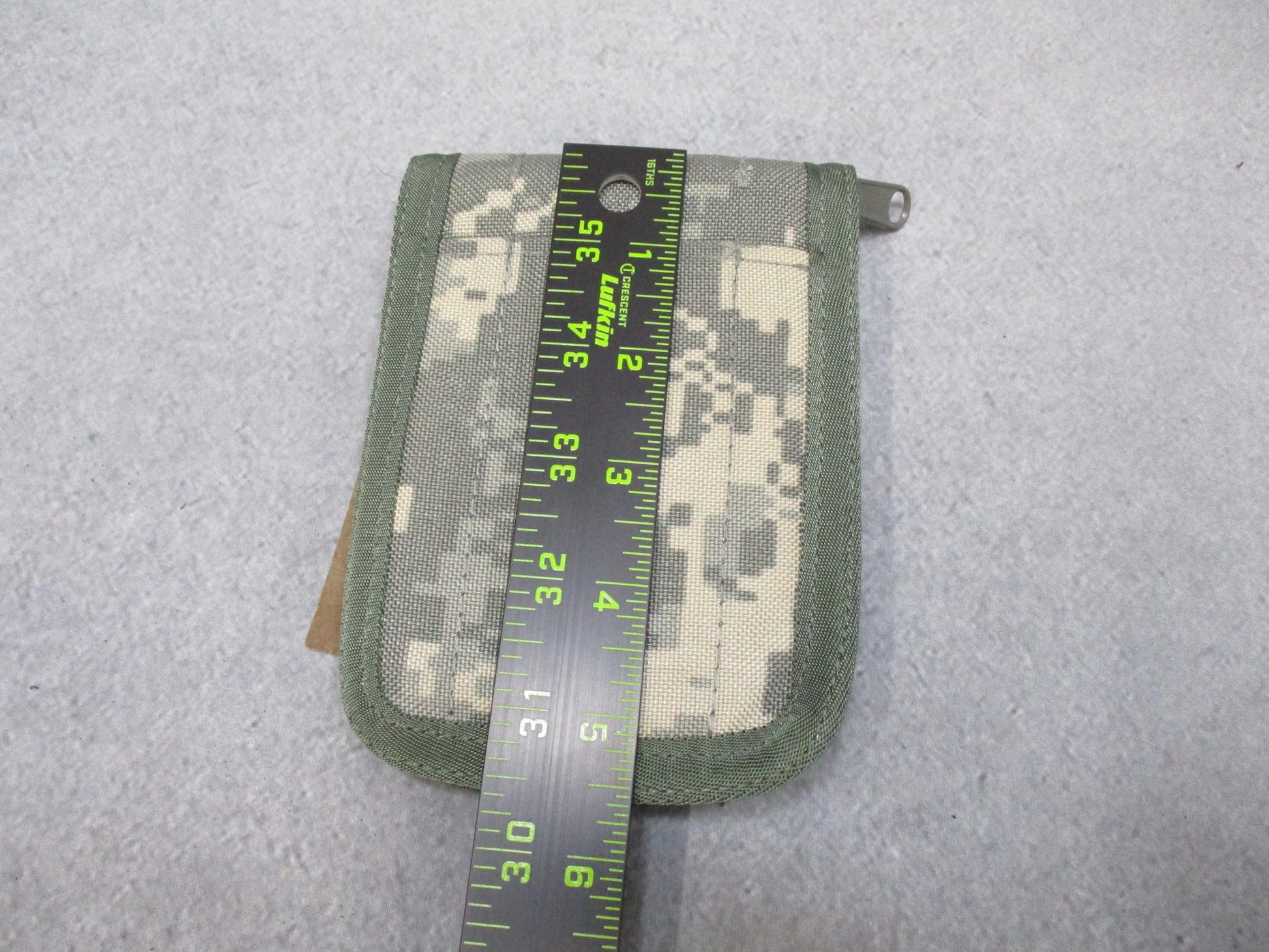 Centex Military Gear Rite in the Rain 935A-KIT spiral notebook with ACU Cordura cover and all-weather pen for outdoor writing.