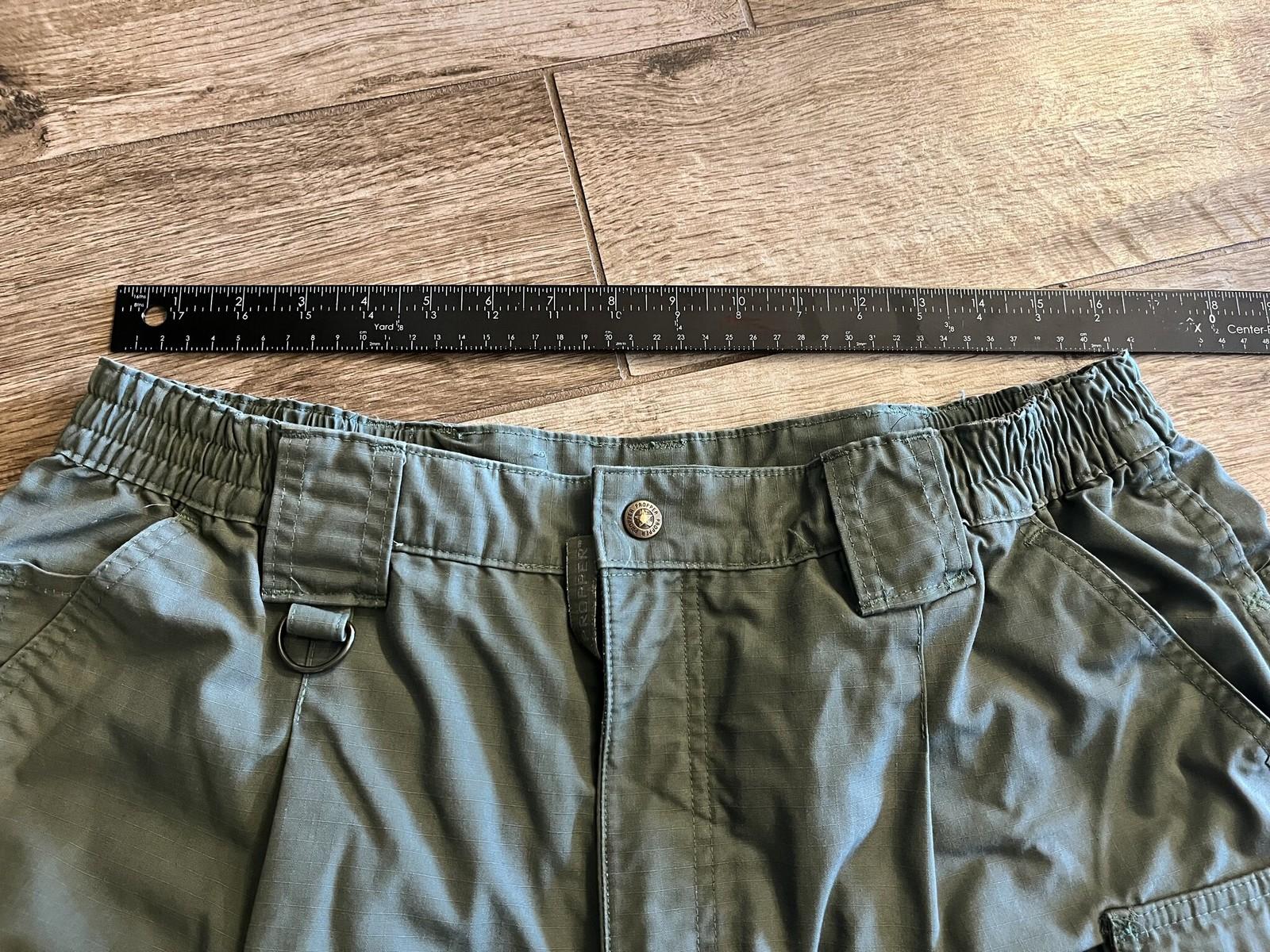 Men's Propper tactical cargo pants in olive drab ripstop fabric, size 36/34, by Centex Military Gear, featuring multiple pockets and durable material.