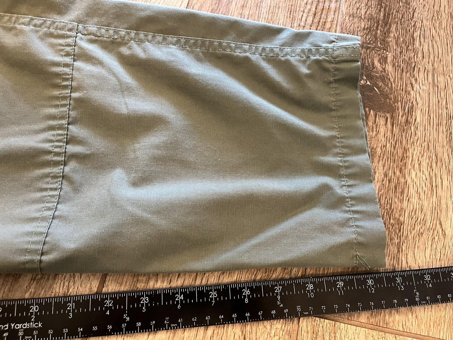 Men's Propper tactical cargo pants in olive drab ripstop fabric, size 36/34, by Centex Military Gear, with multiple cargo pockets.