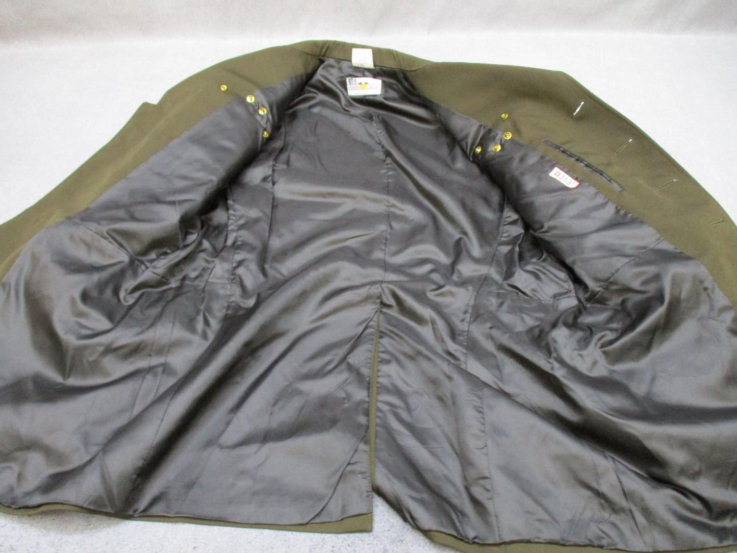 US Army AGSU service dress coat in heritage green with ribbons, displayed on a mannequin, by Centex Military Gear.