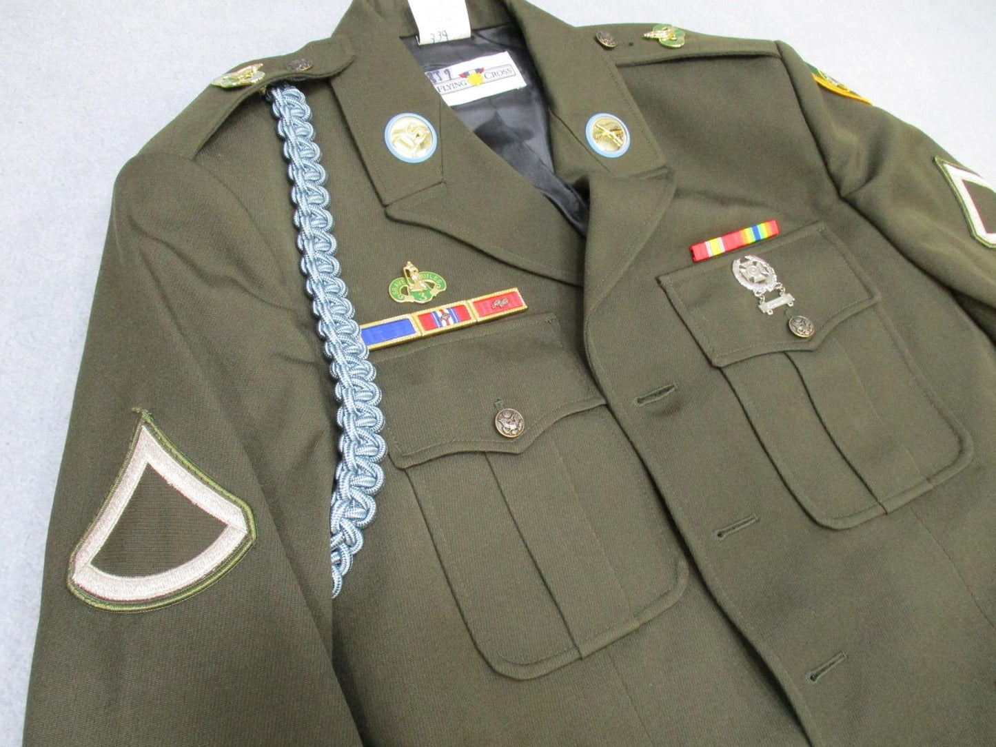 US Army AGSU service dress coat jacket in heritage green with ribbons, featuring detailed military uniform design by Centex Military Gear.