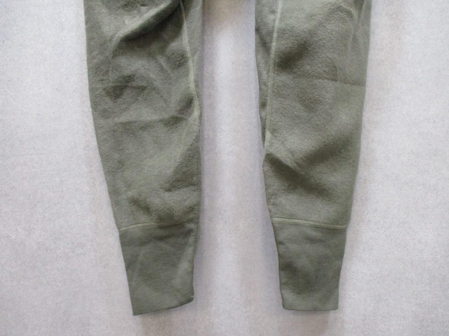 Polartec Thermal-FR NOMEX army midweight flame-resistant long johns pants in small size, designed for thermal and fire protection.