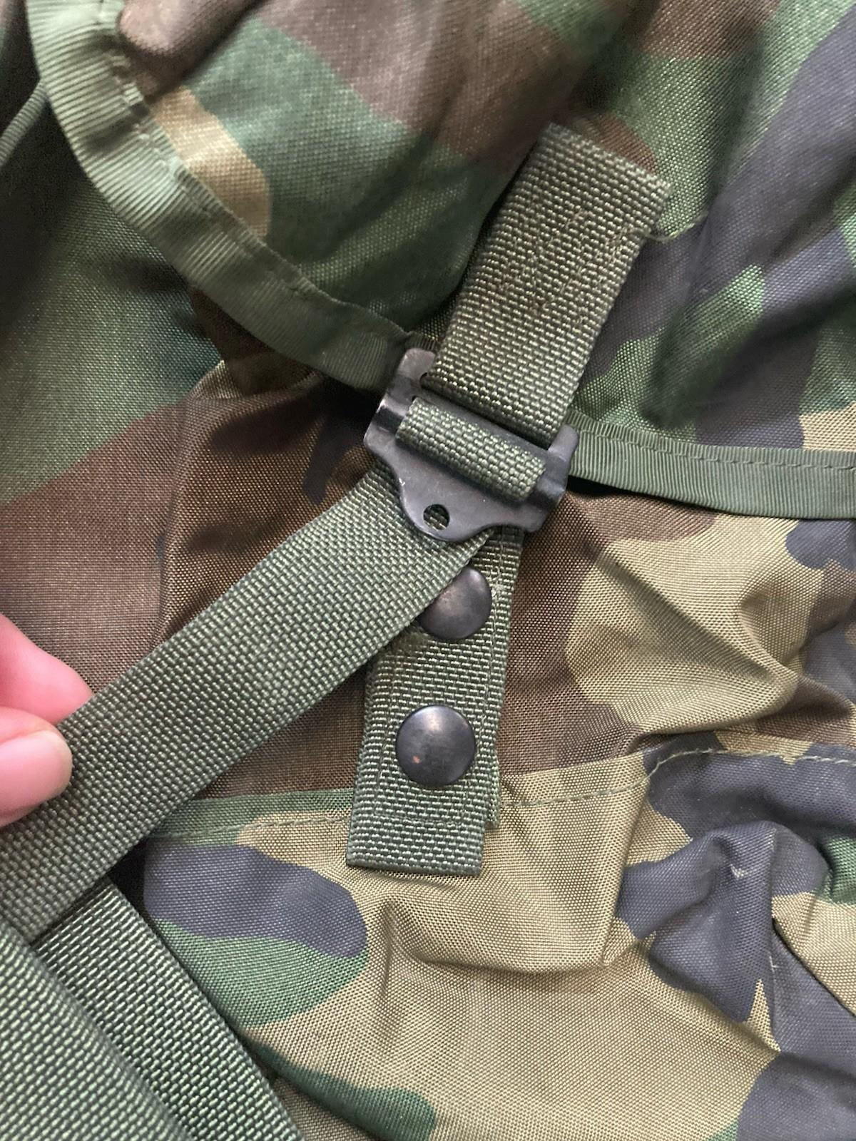 Centex Military Gear Alice Pack M81 Woodland tactical assault bag with multiple compartments and writing on the durable fabric.