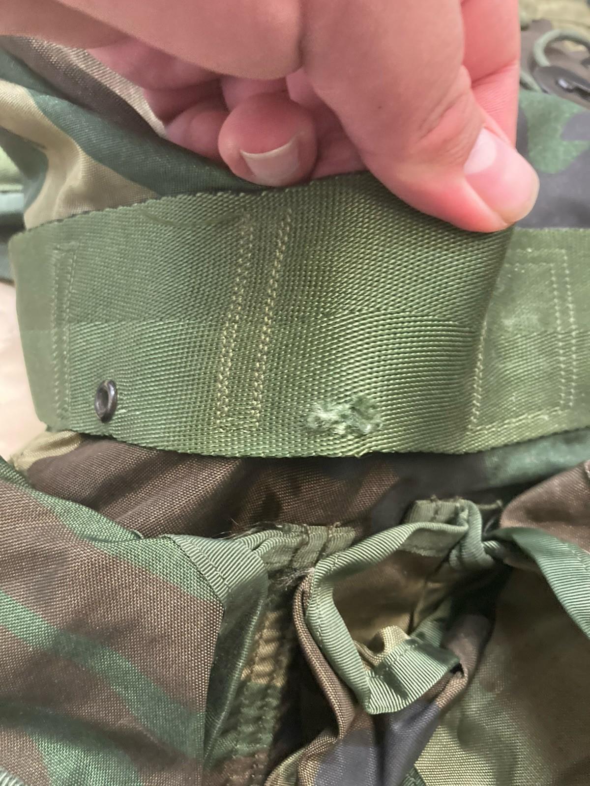 Centex Military Gear Alice Pack M81 Woodland tactical assault bag with multiple compartments and writing on the durable fabric.