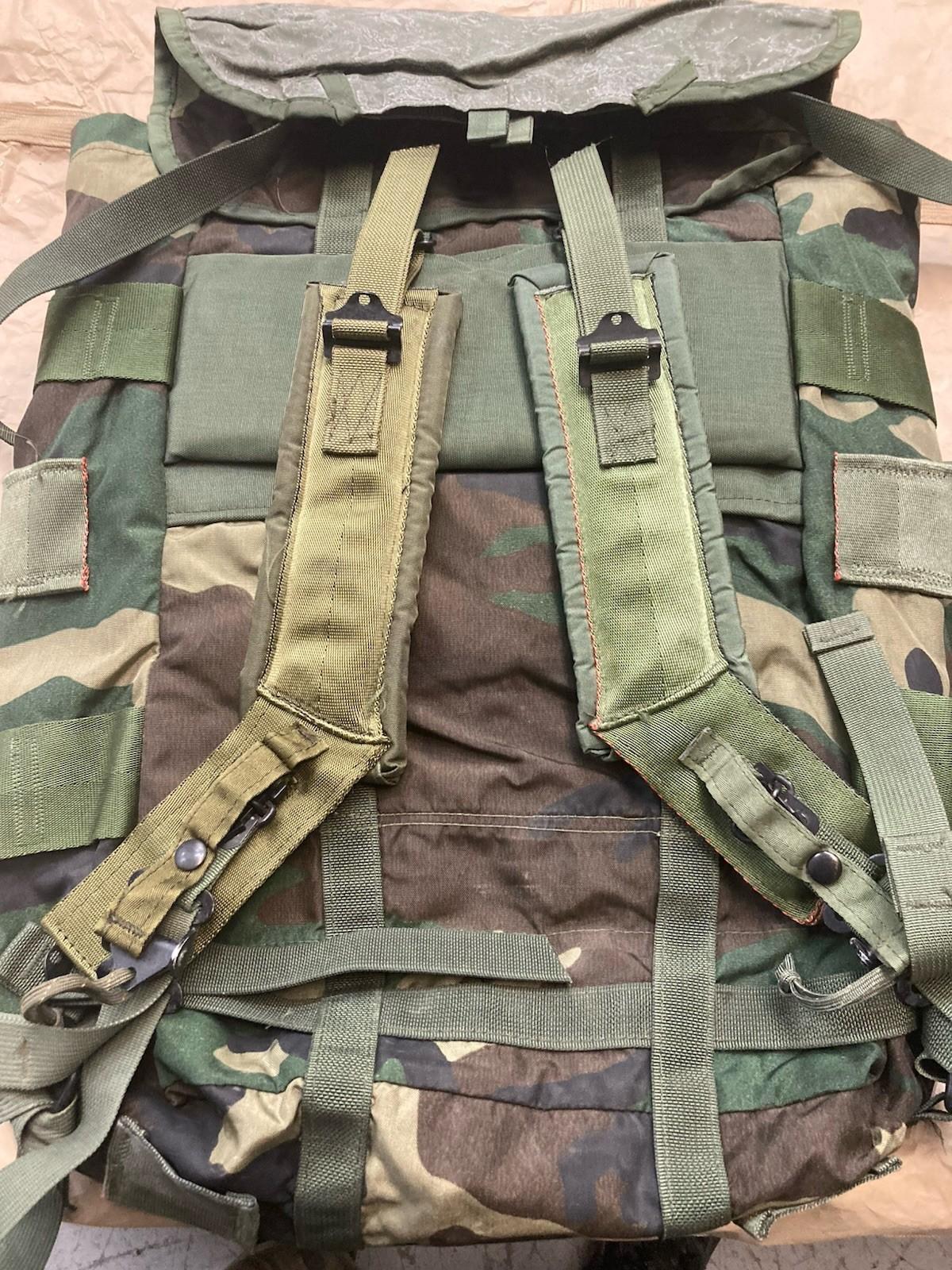 Centex Military Gear Alice Pack M81 Woodland tactical bag with writing, featuring multiple compartments and sturdy straps for outdoor use.