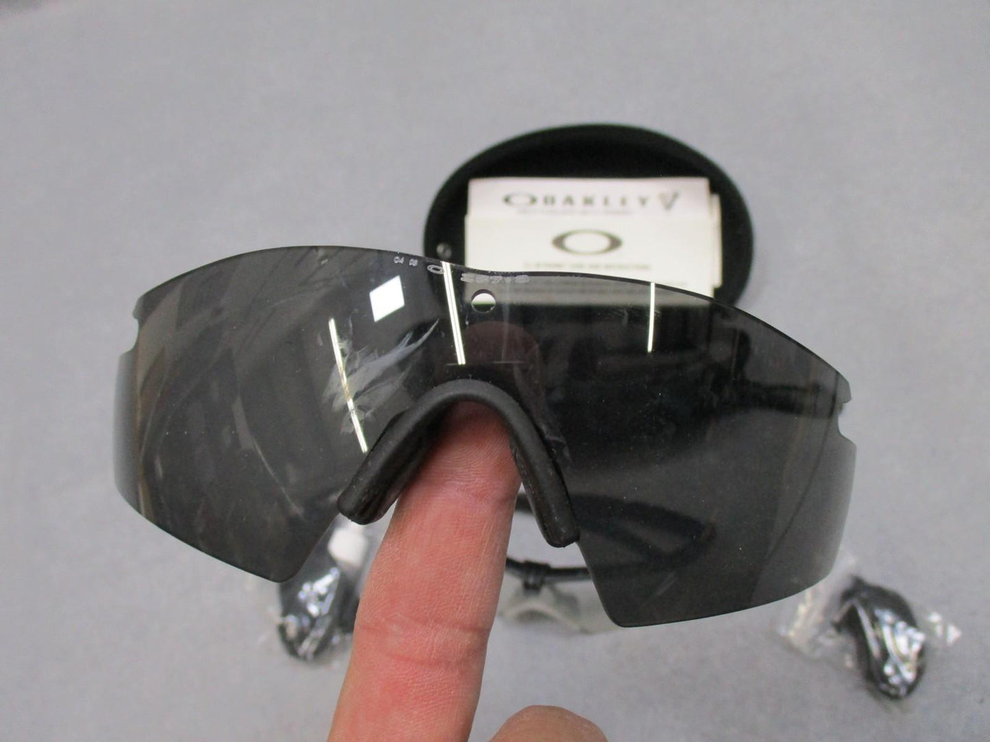 Oakley SI M Frame 2.0 ballistic safety glasses kit with multiple lenses and case, designed for military and tactical use