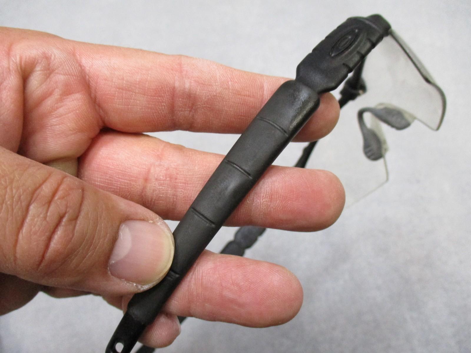 Military Oakley SI Frame 2.0 safety glasses with multi-lens kit and case, featuring Z87+ ANSI protection and durable construction.