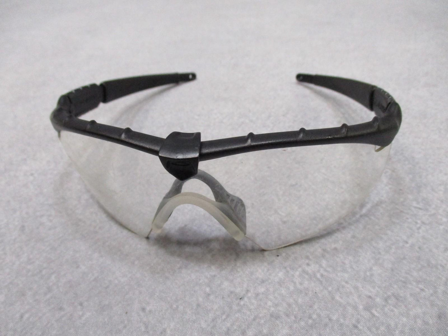 Military Oakley SI Frame 2.0 safety glasses with multi-lens kit and case, featuring Z87+ ANSI certification and durable design.