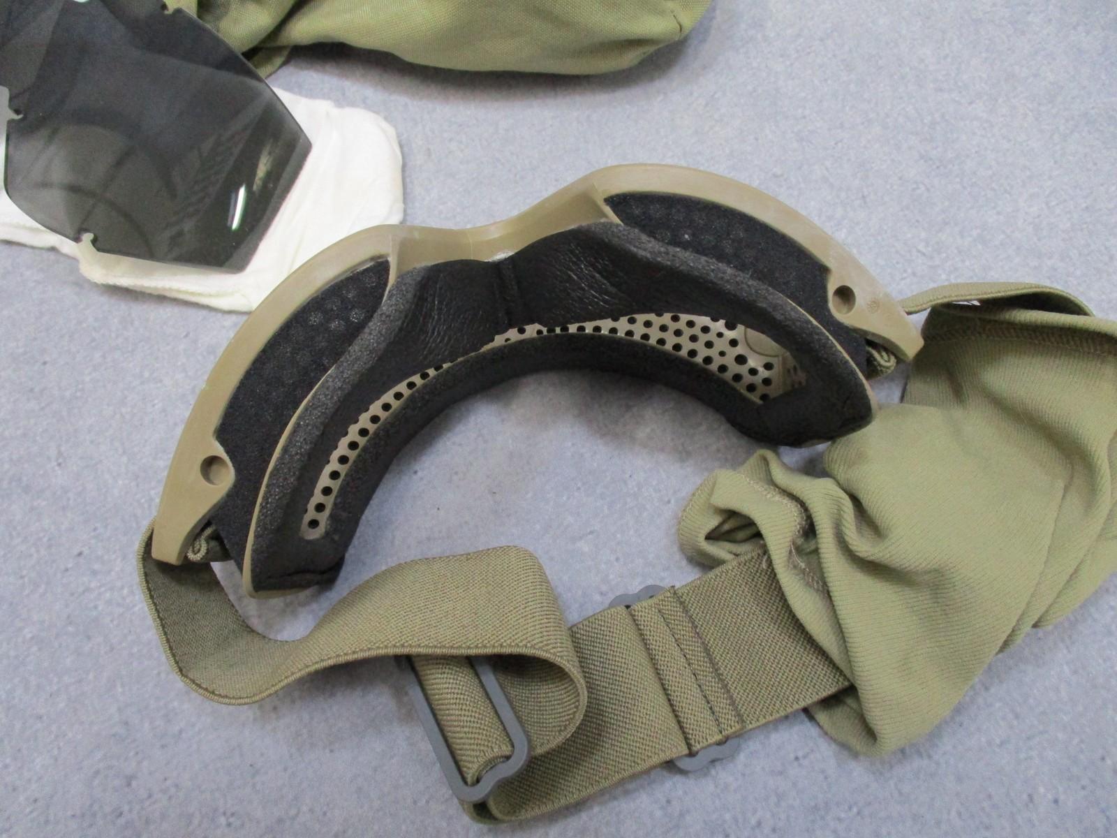 Used USGI ESS APEL ballistic goggles with tinted lens and pouch, featuring military-grade protective eyewear by Centex Military Gear.