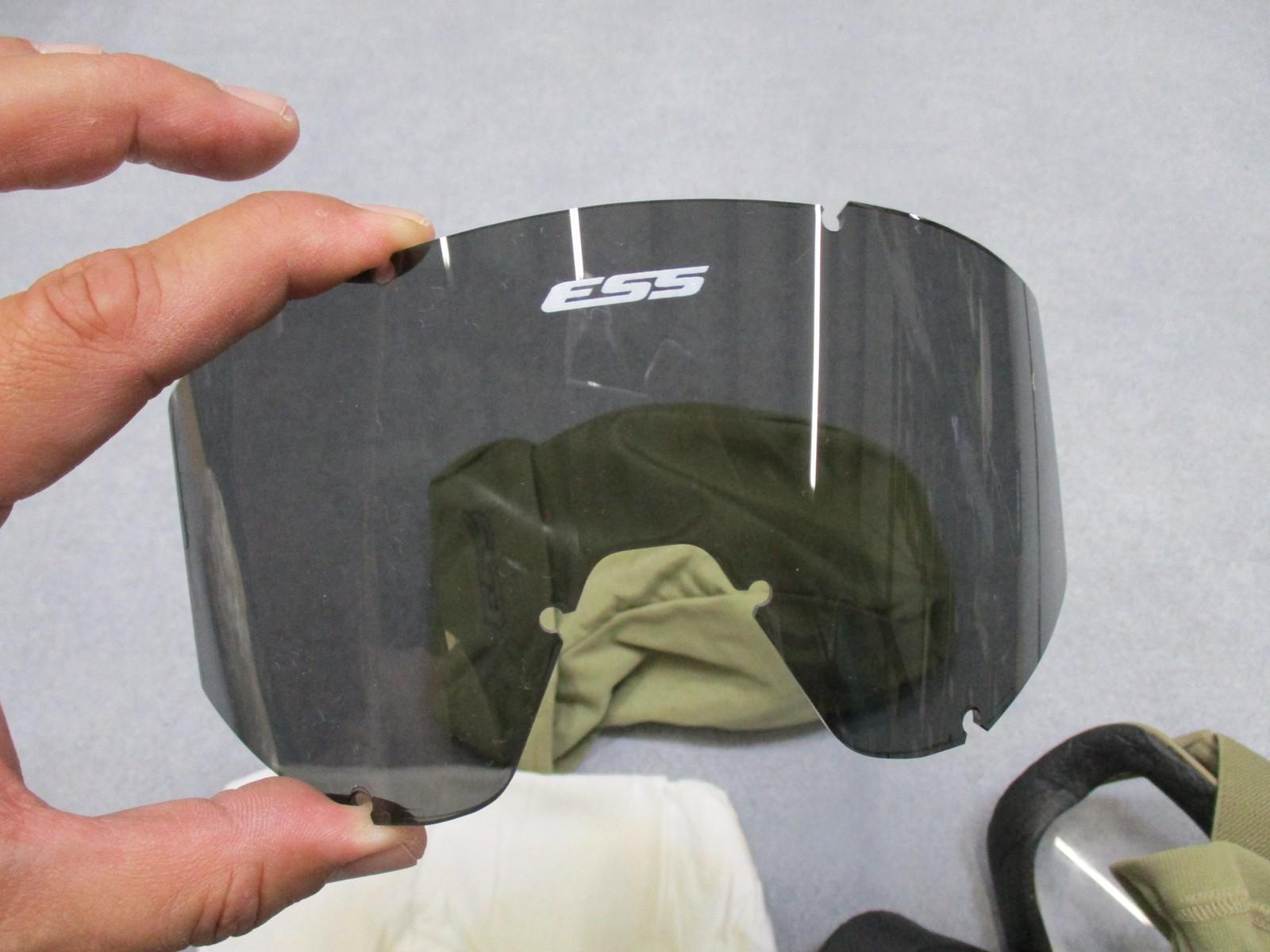 USGI military ESS APEL ballistic goggles with tinted lens and pouch, used condition, featuring a secure strap and impact-resistant design.