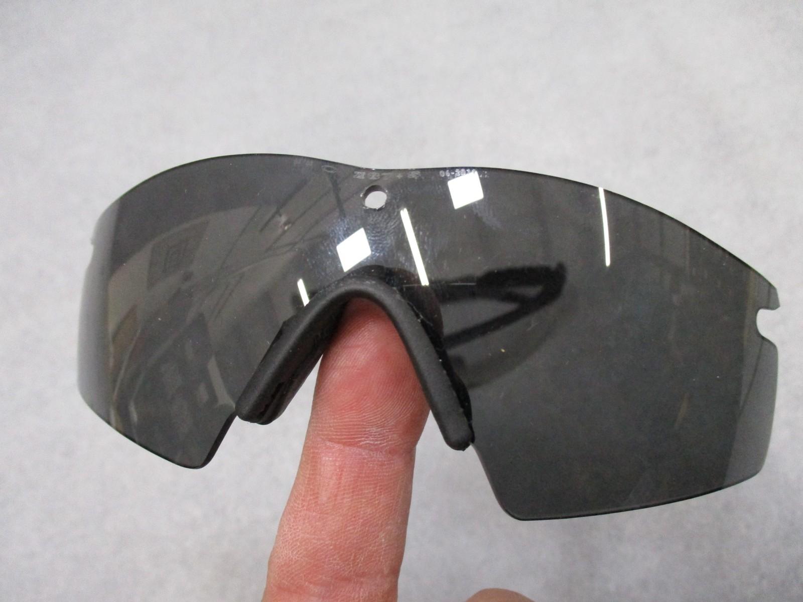 Military Oakley SI M Frame 2.0 shooting safety glasses with three lenses and case, designed for tactical and shooting use.