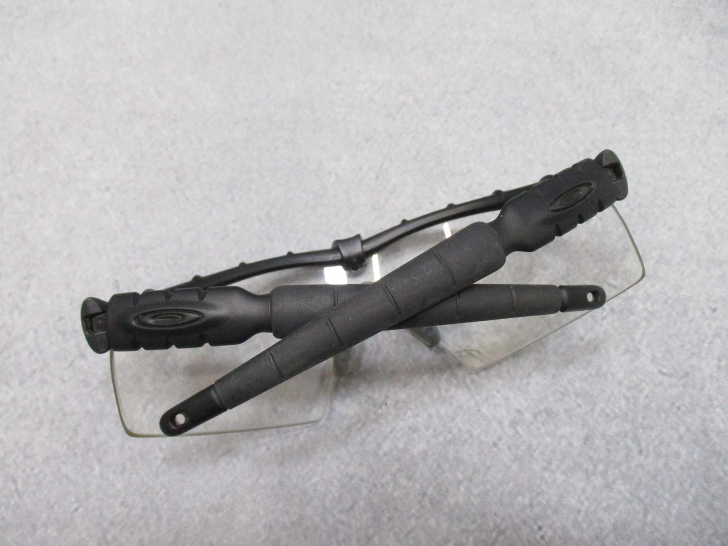 Military Oakley SI M Frame 2.0 shooting safety glasses with three lenses and case, designed for tactical use by Centex Military Gear.